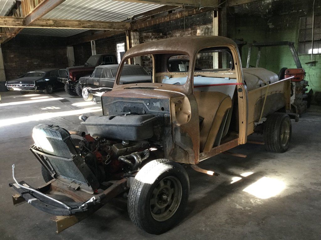 close up front view of truck with no hood