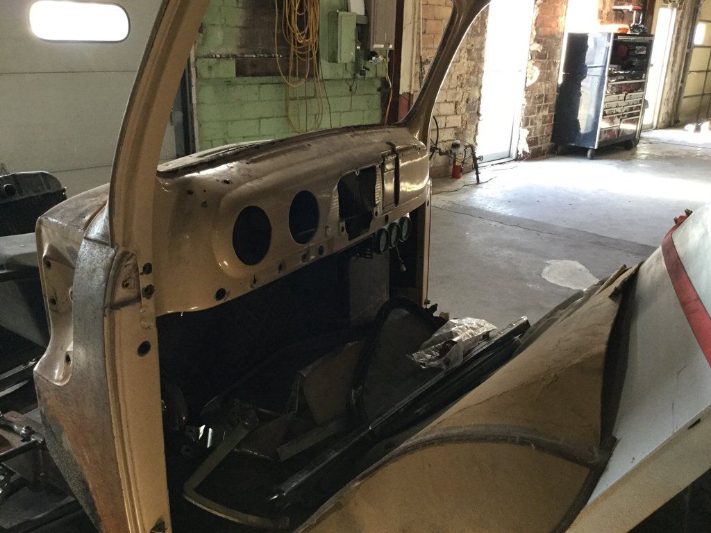 driver side view of front seats with readings removed and no pedals