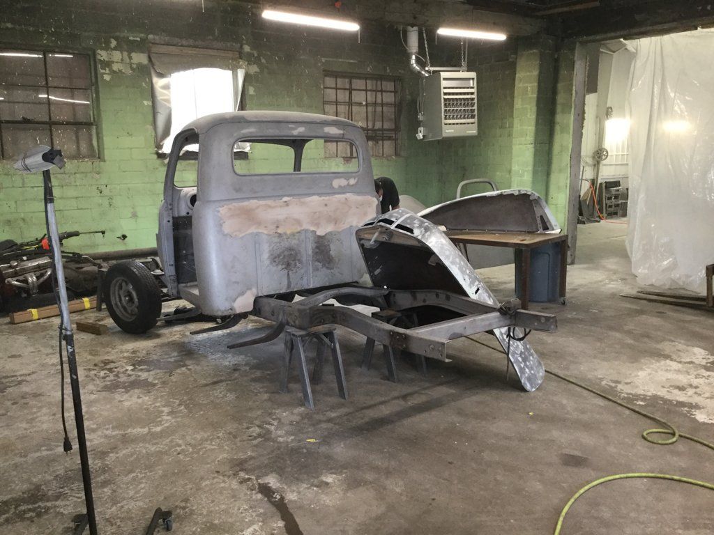 rear view of truck frames with front wheels and bed removed