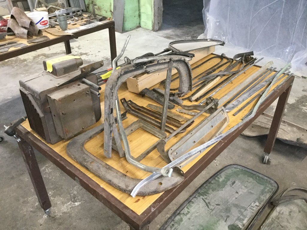 isometric view of truck frame parts on workbench