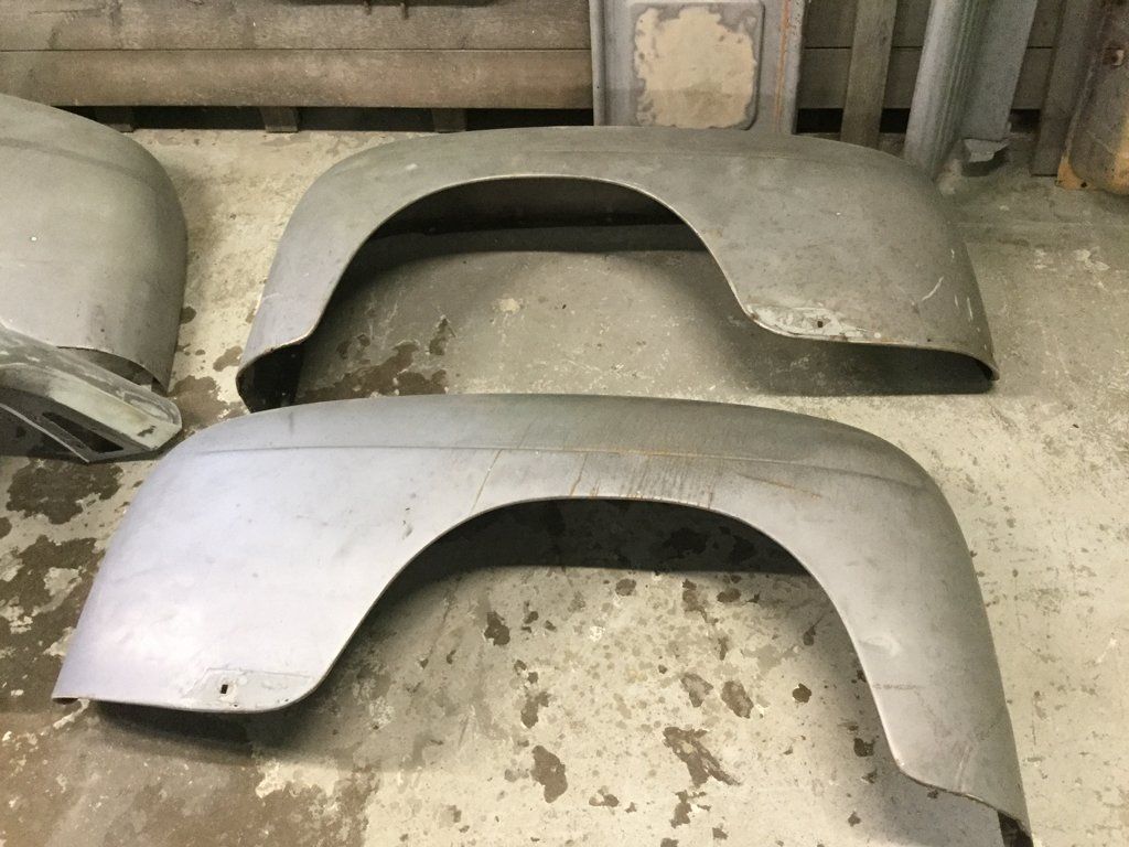 close up of front truck fenders on ground