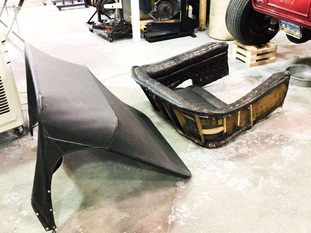 overhead car cover and seat removed from car