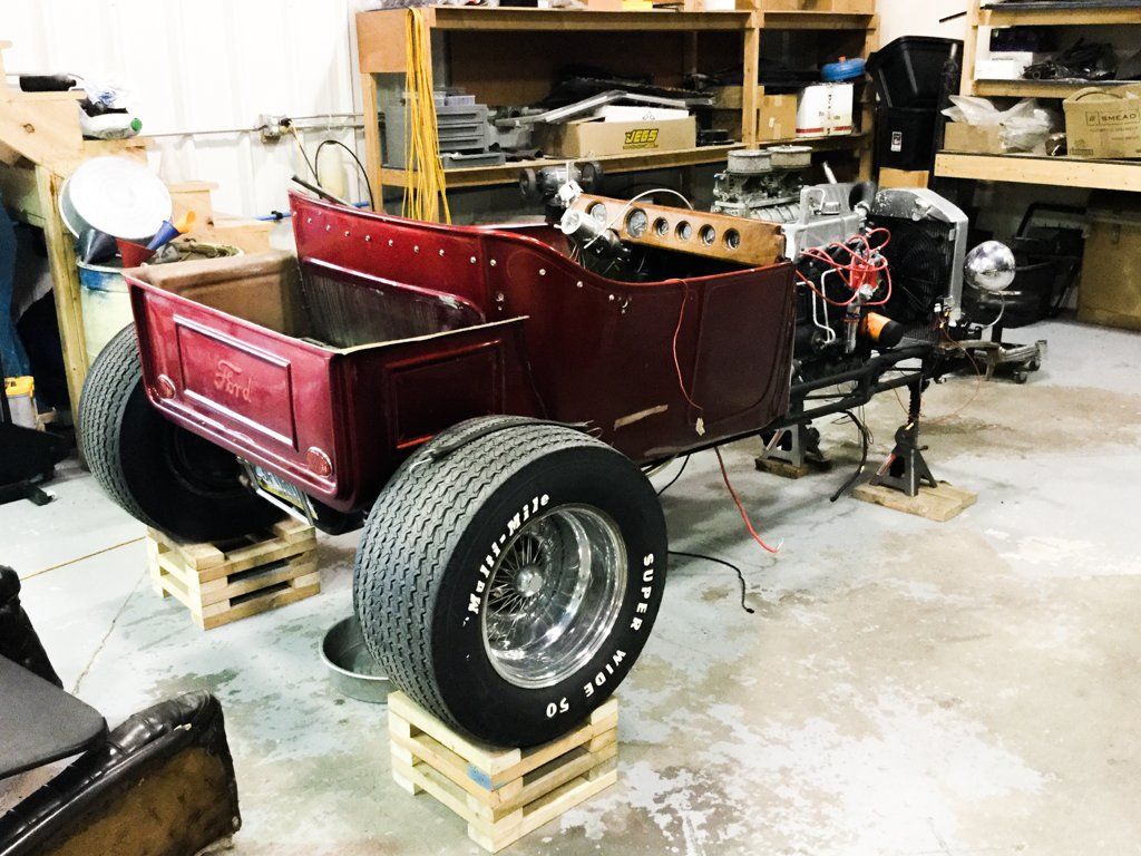 rear view of vehicle with front wheels removed