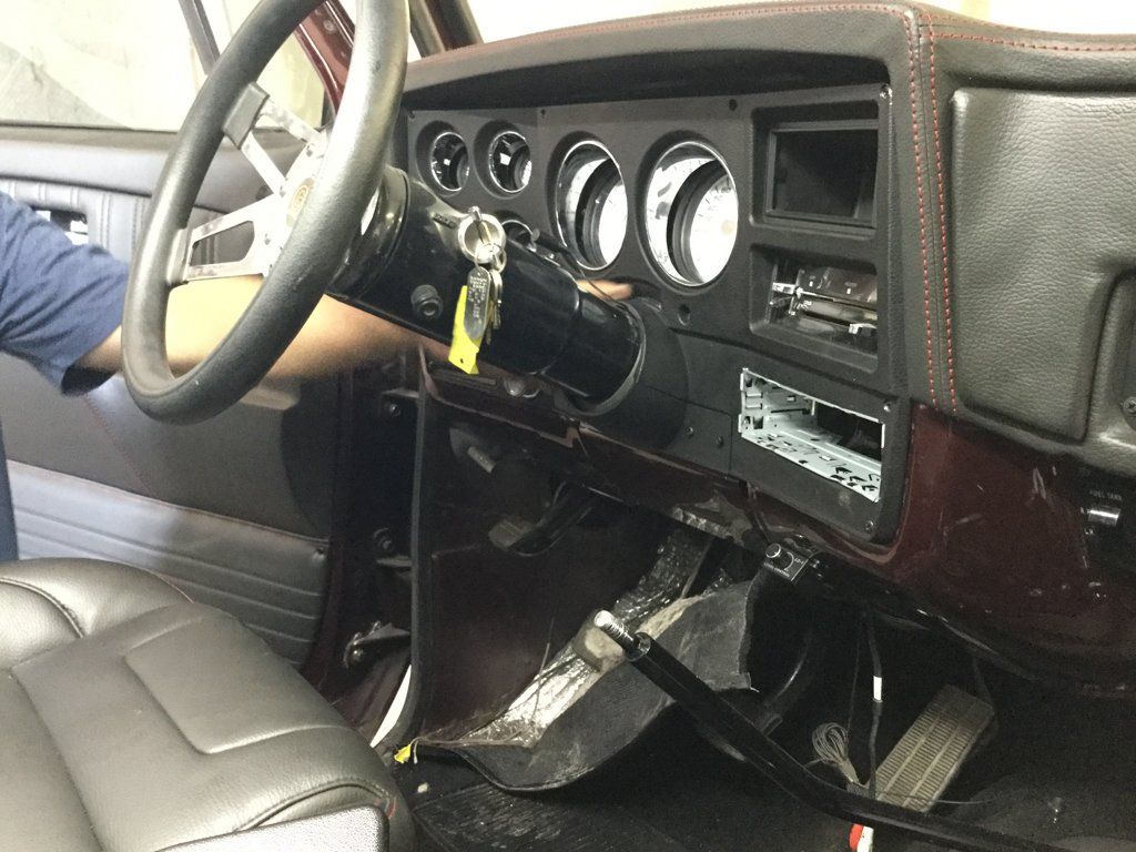interior view of driver seat flooring with shifter removed