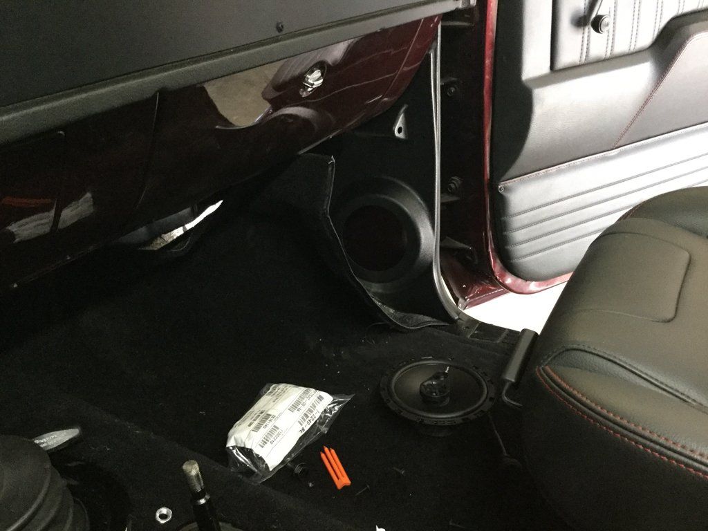 interior view of passenger front seat flooring and glovebox