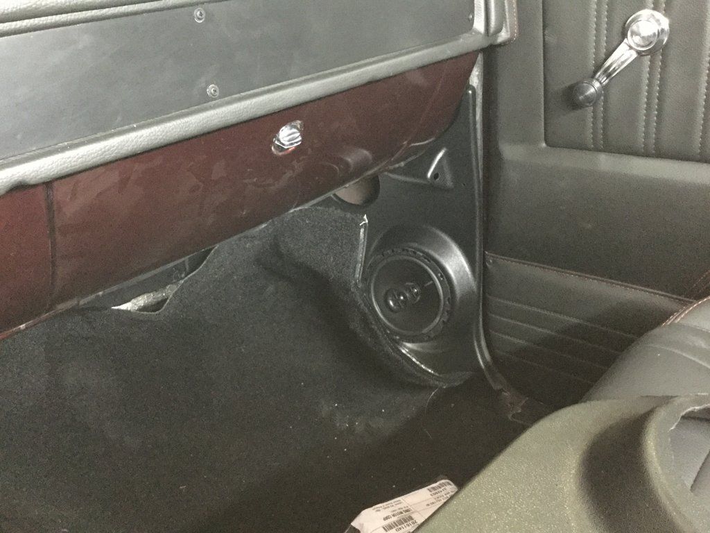 interior view of passenger front seat flooring and glovebox