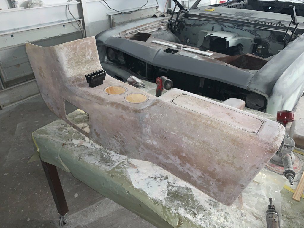 sanded wooden center console