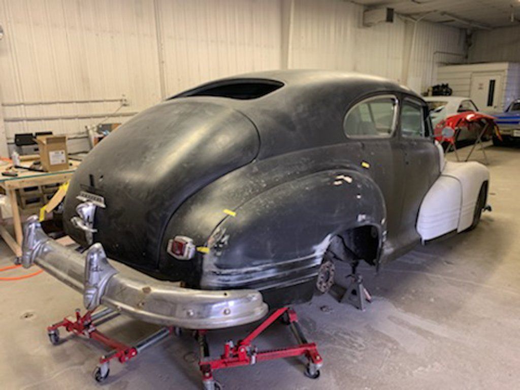 rear view of car with rear suspended