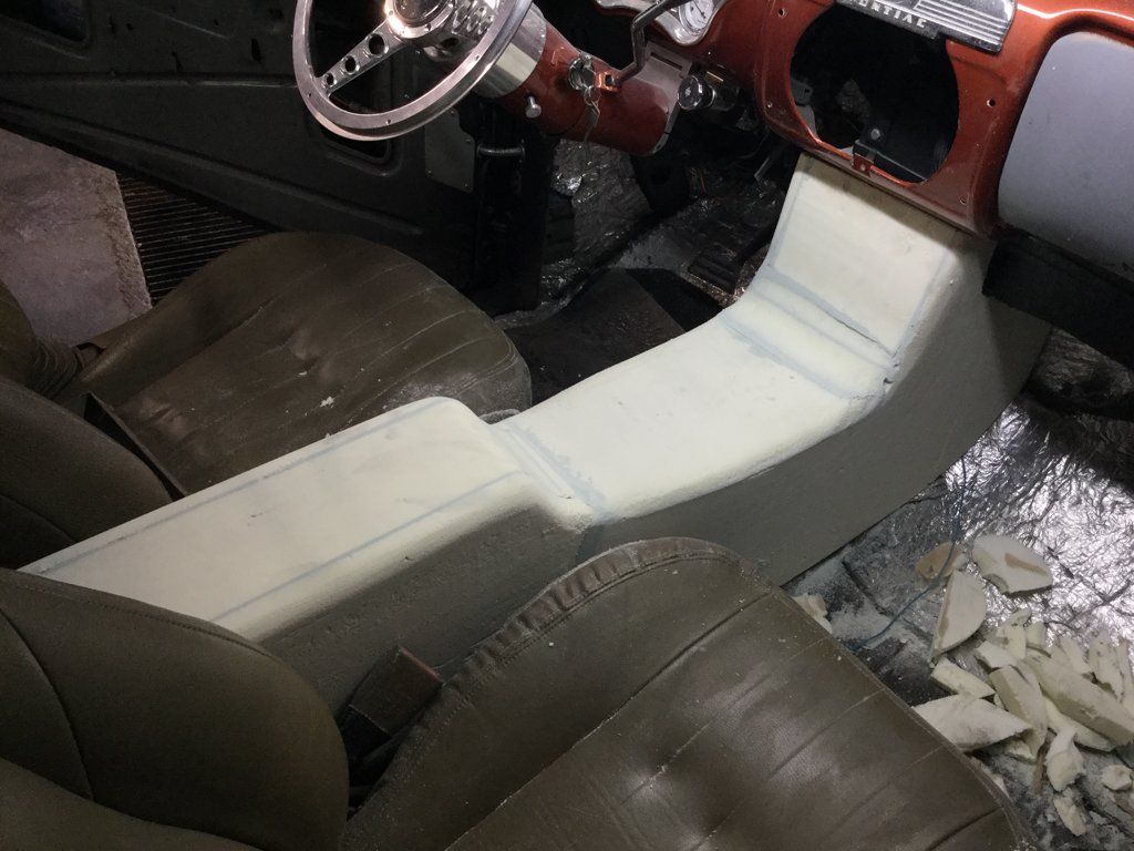 front passenger view of wooden console in car