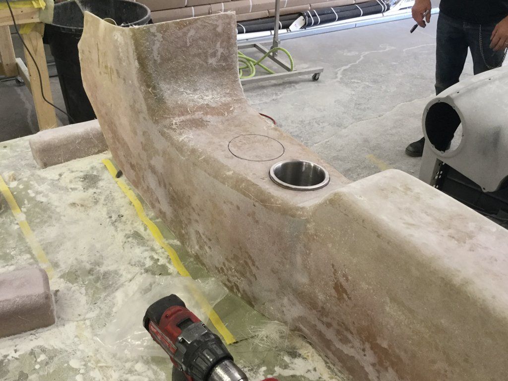 wooden console with cup holder installed