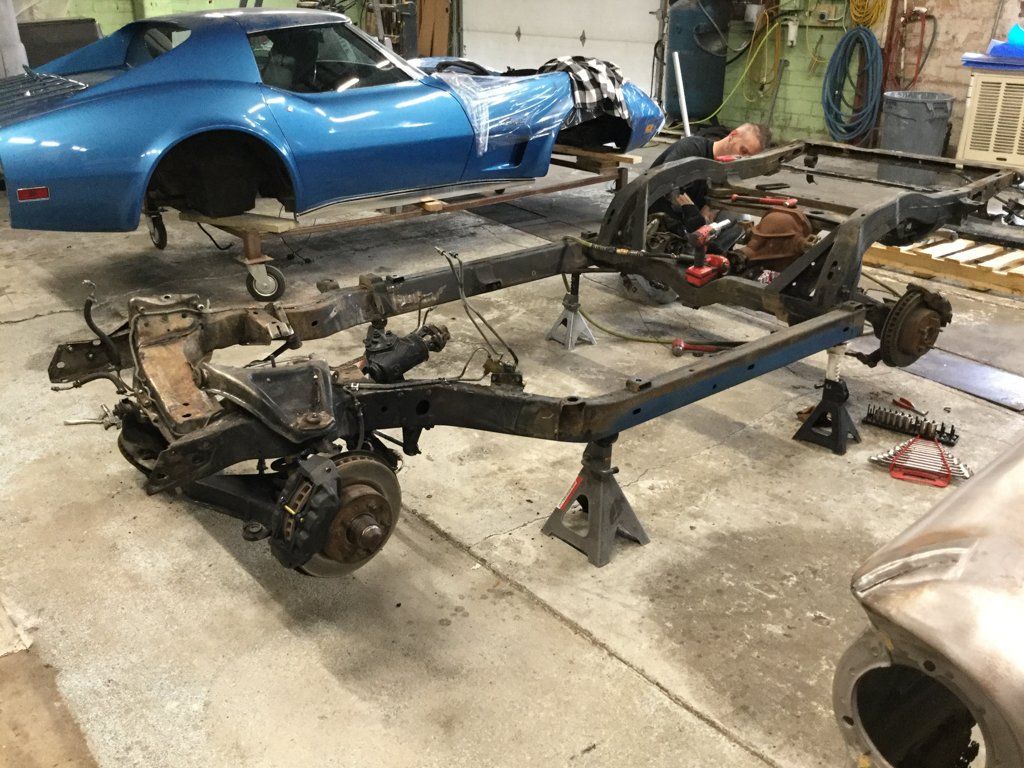 car chasis close up next to car body