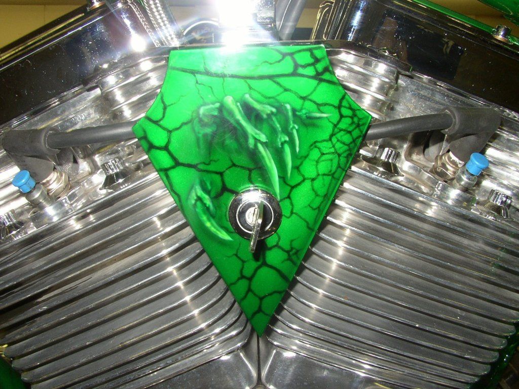 customized key ignition with skeleton hand and chrome engine