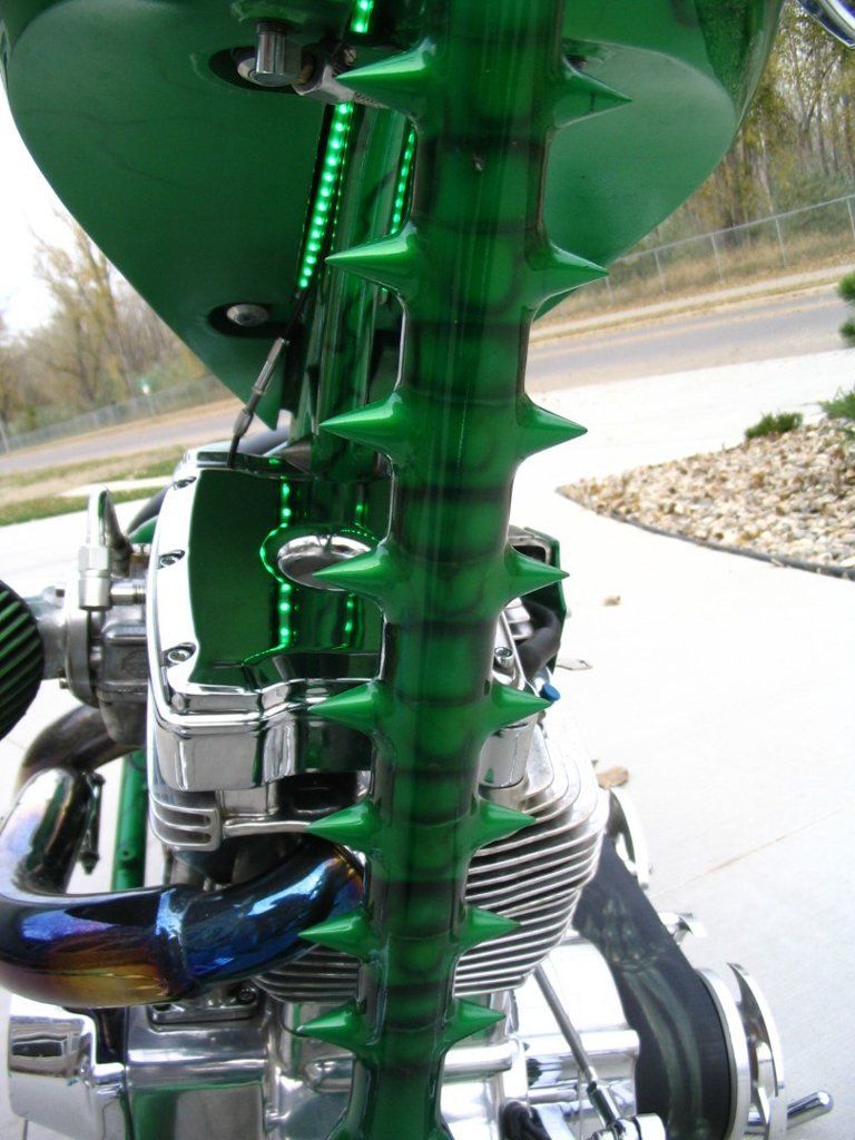 spike spine design on green chopper frame