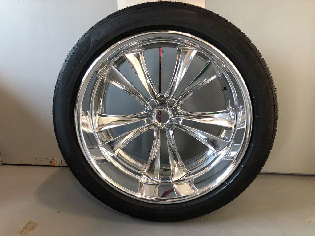 isolated chrome car rim