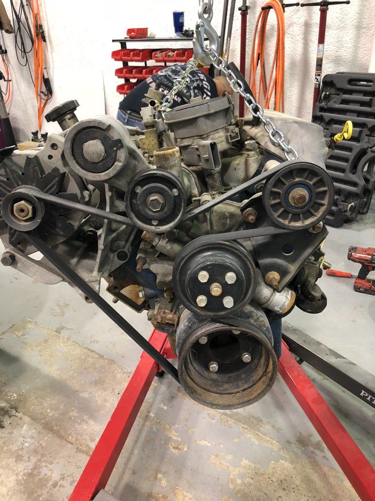 engine suspended by chain