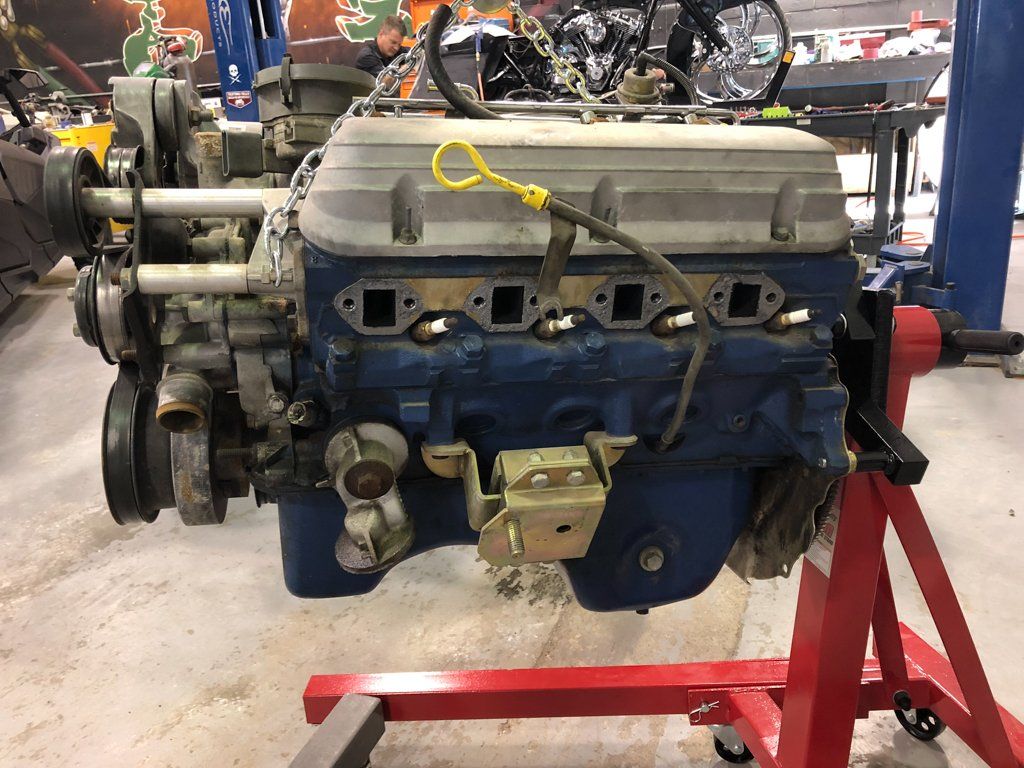 side view of engine suspended