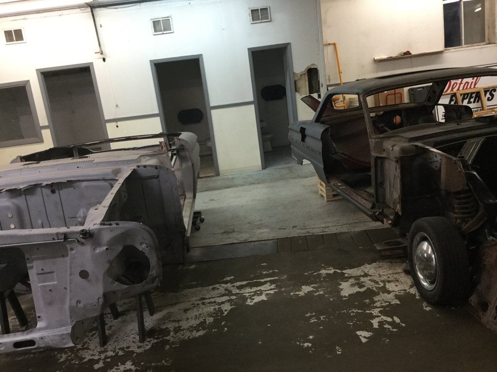 car body next to car with no doors