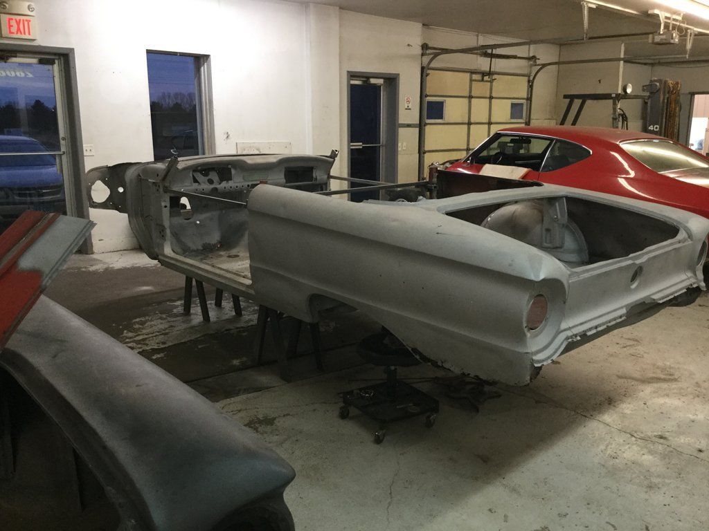 side view of car body without roof