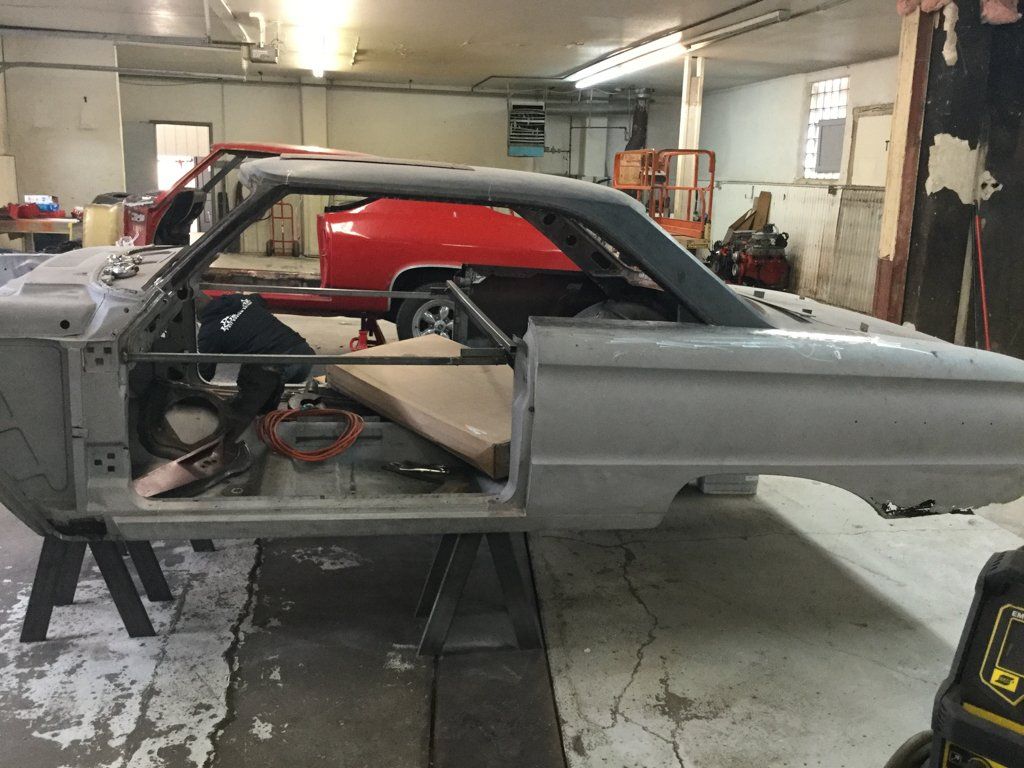 side view of car in service bay