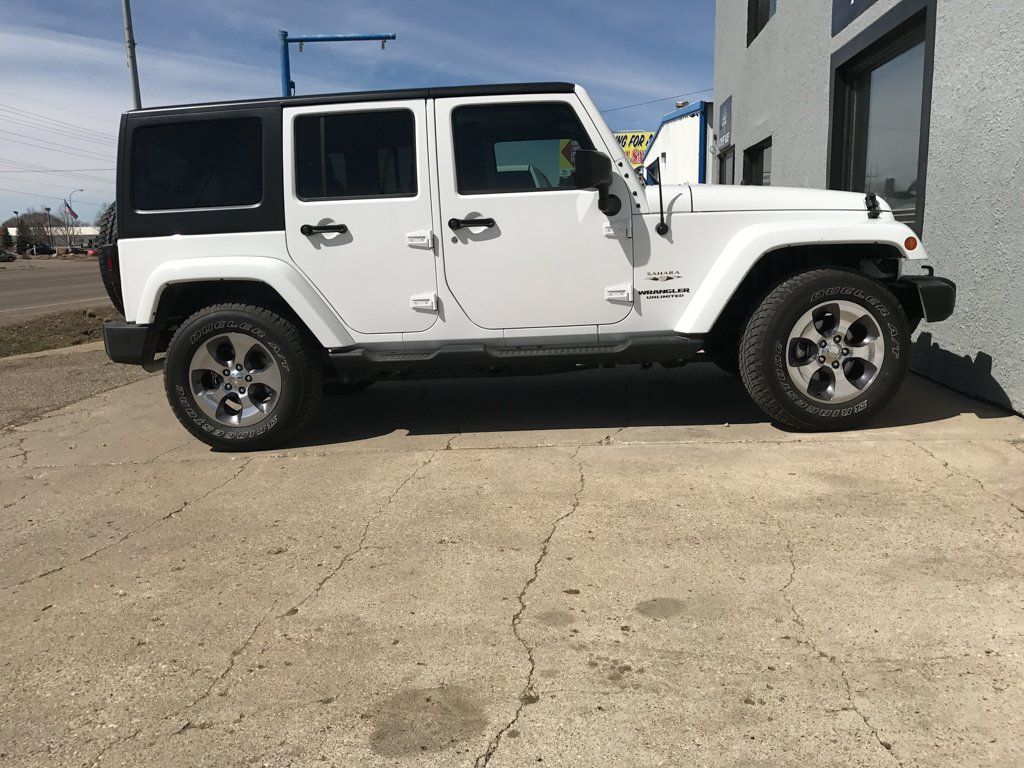 side view of white jeep before getting customized