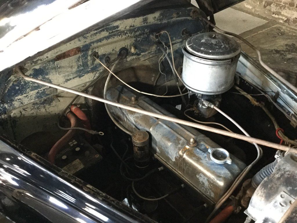 hood open with engine