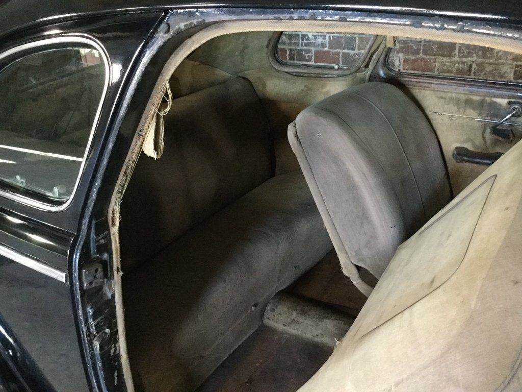 black 1940 chevy special deluxe coupe back passenger seats