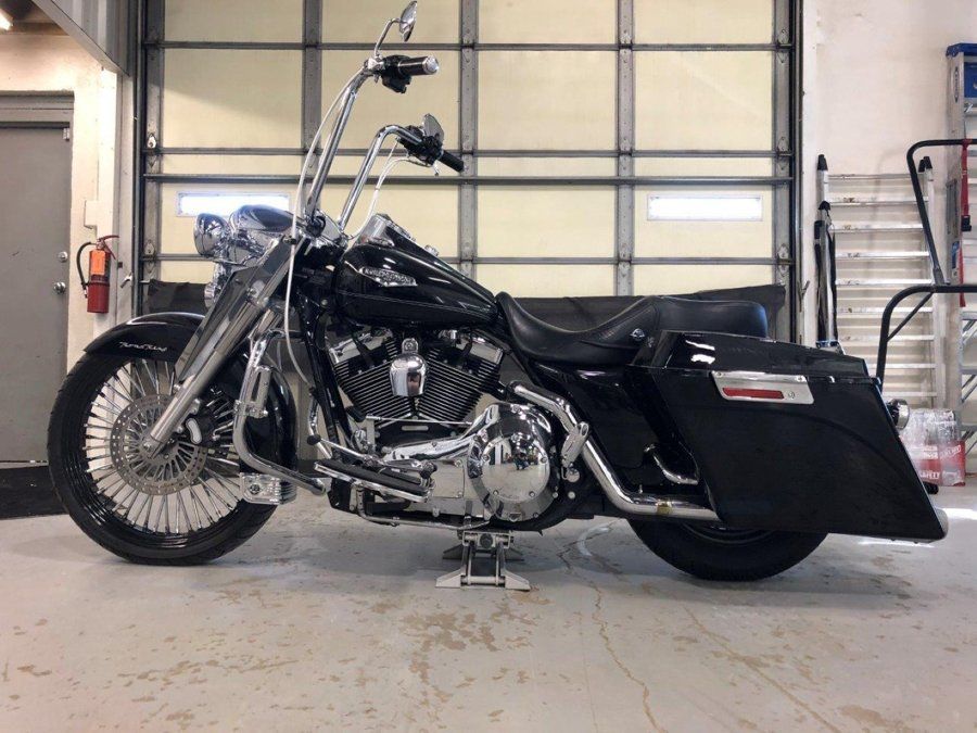 left side view of custom black chopper