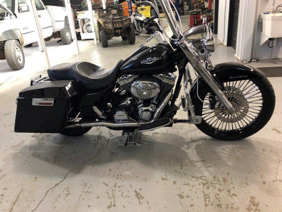 right side view of custom black chopper