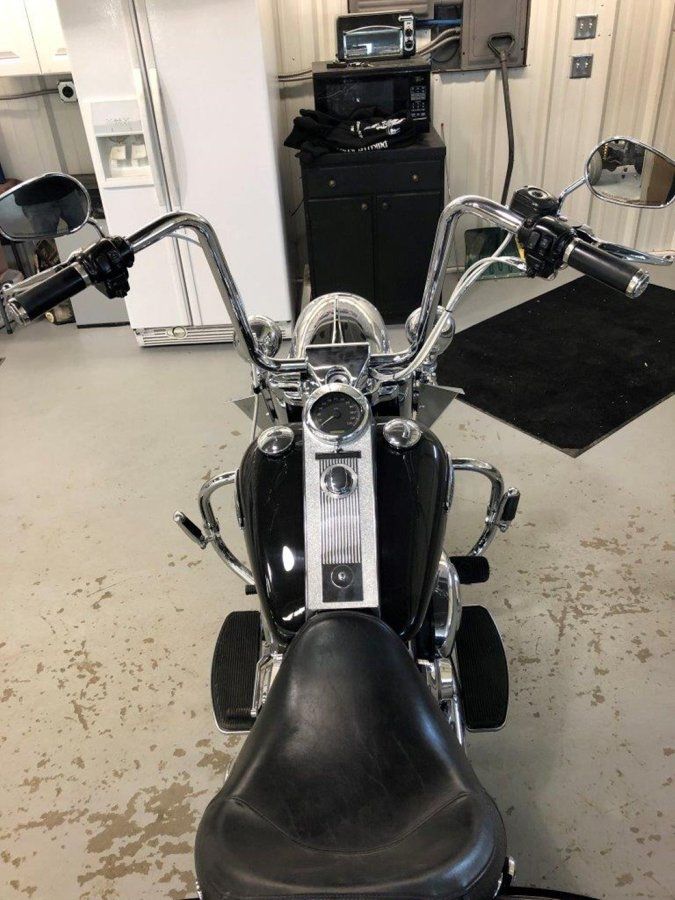 driver's point of view of customized black chopper