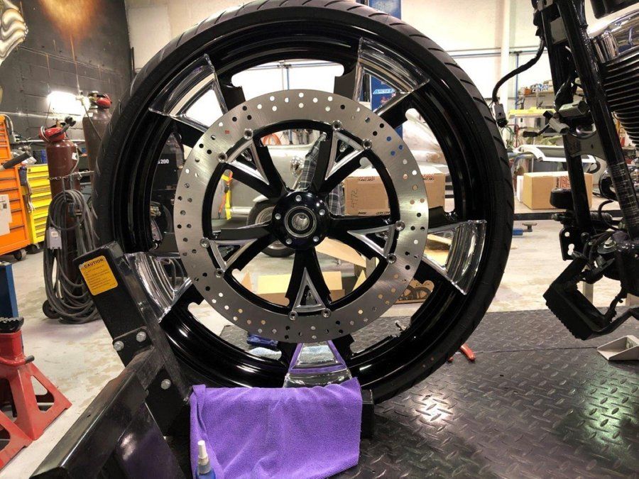 black chopper front wheel with microfiber cloth