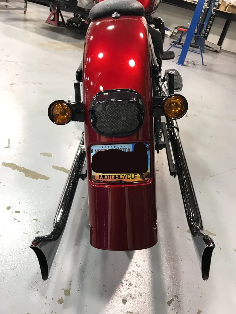 customized red and black chopper rear fender