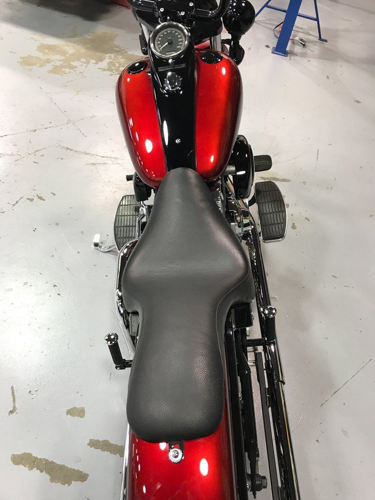 customized red and black chopper driver's view of seat