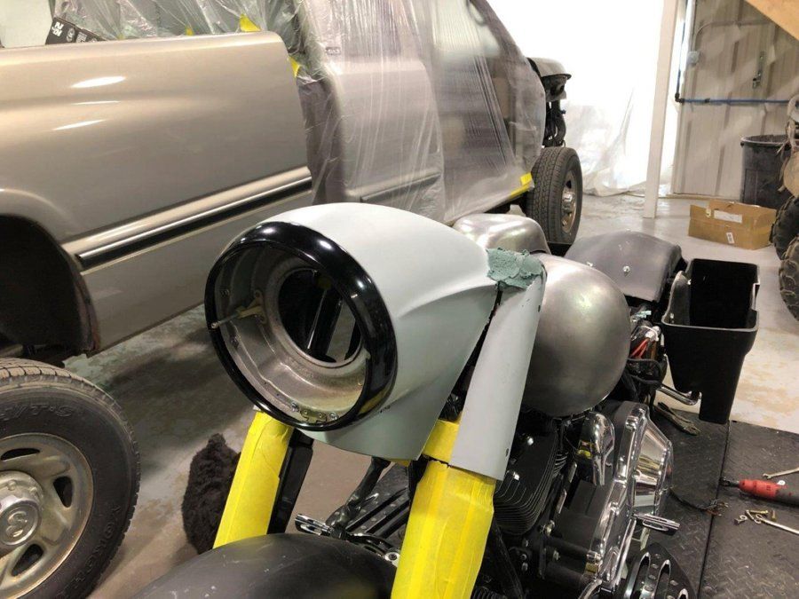 front view of black chopper with new headlight cover