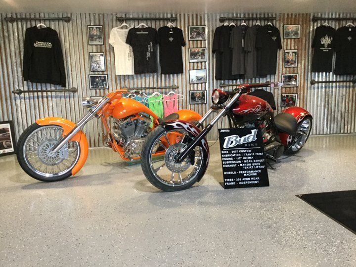 line up of custom orange and red motorcycle bud