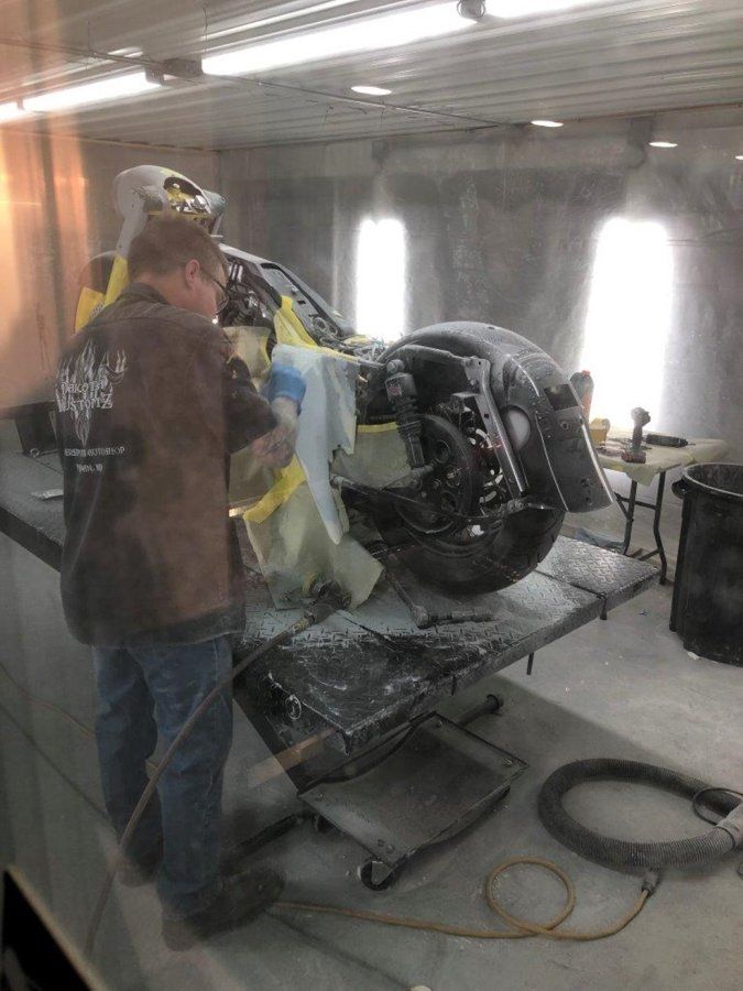 painter painting black chopper