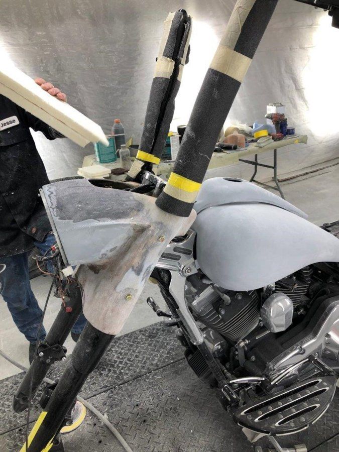 black chopper parts stripped of paint