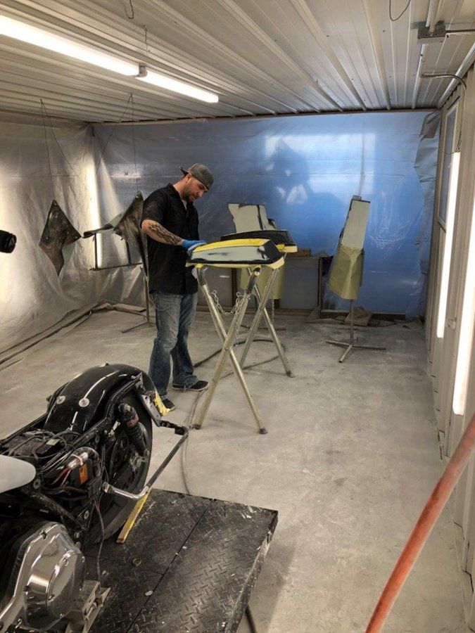 black chopper painted in paint room