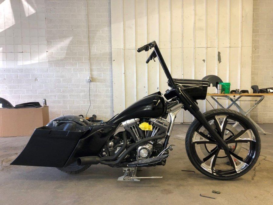 side view of black chopper before customization