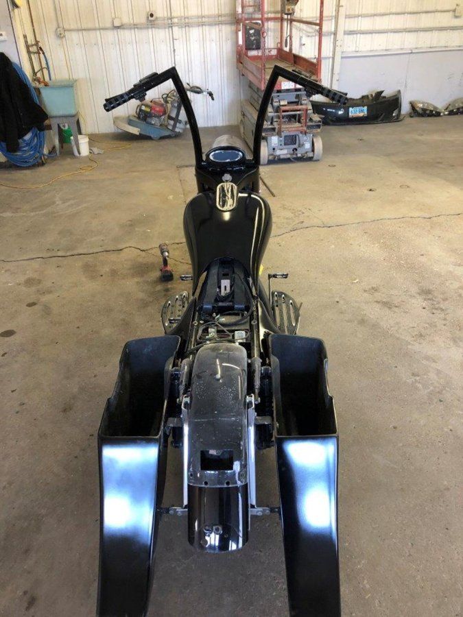 rear view of black chopper before customization