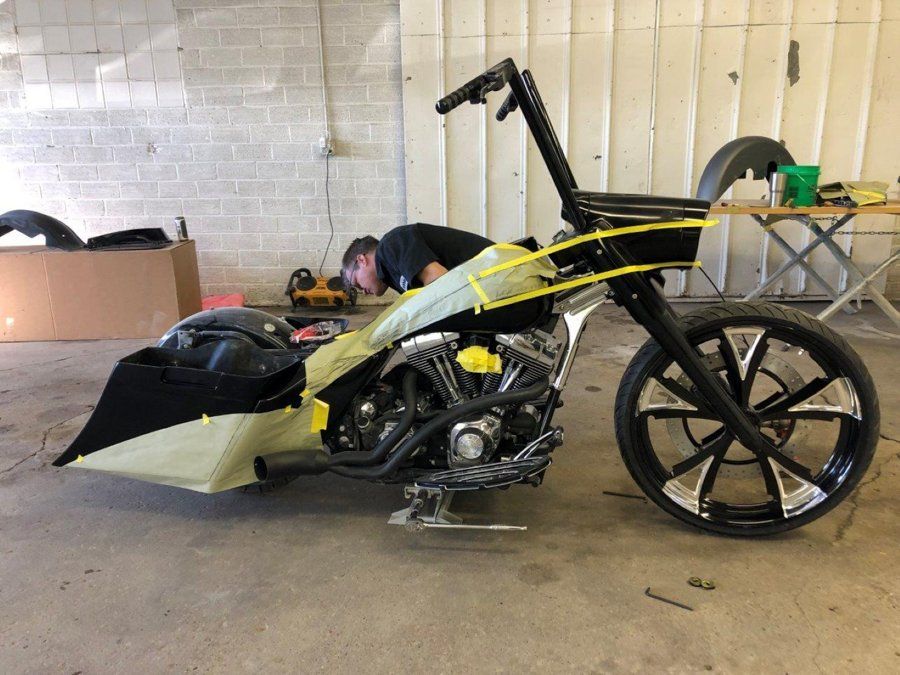 black chopper taped with yellow tape