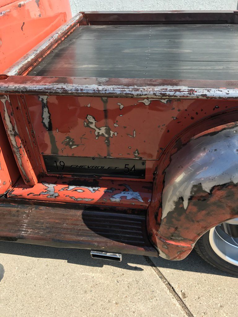 top view of red customized pickup bed cover