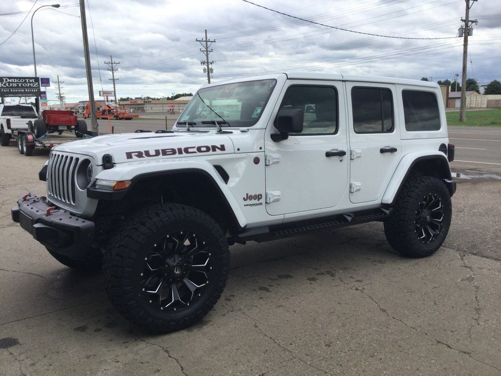 custom white jeep rubicon outdoors