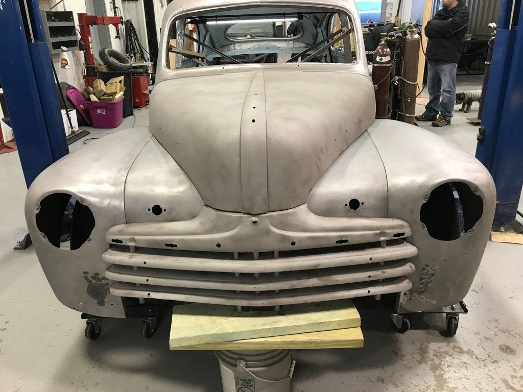 front view of car with no headlights in sockets