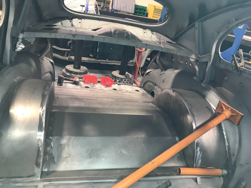 inside view of car looking towards rear of interior