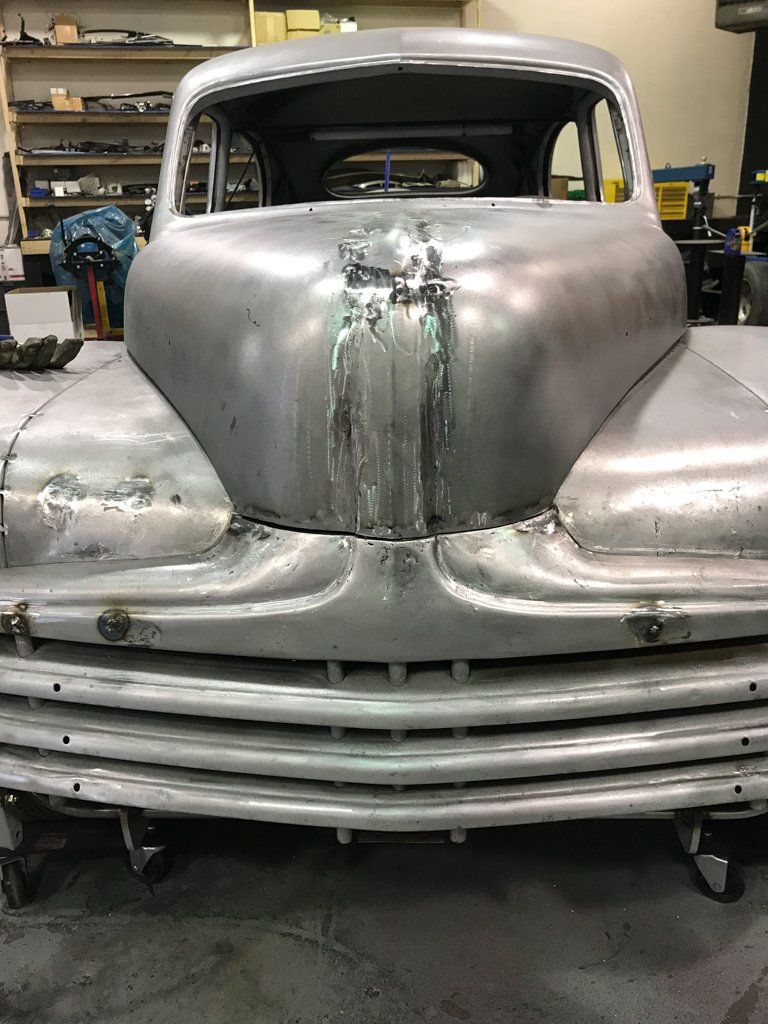 close up of welding on front of car