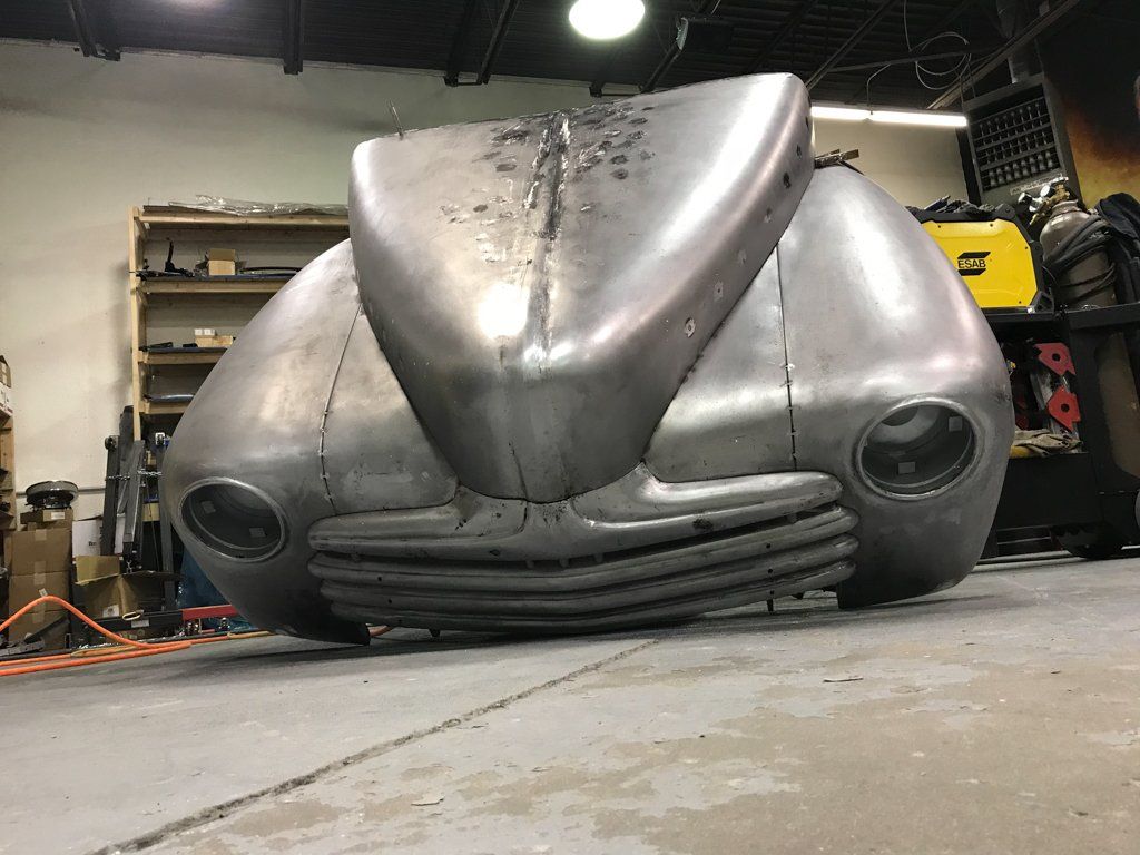 hood opened with paint stripped