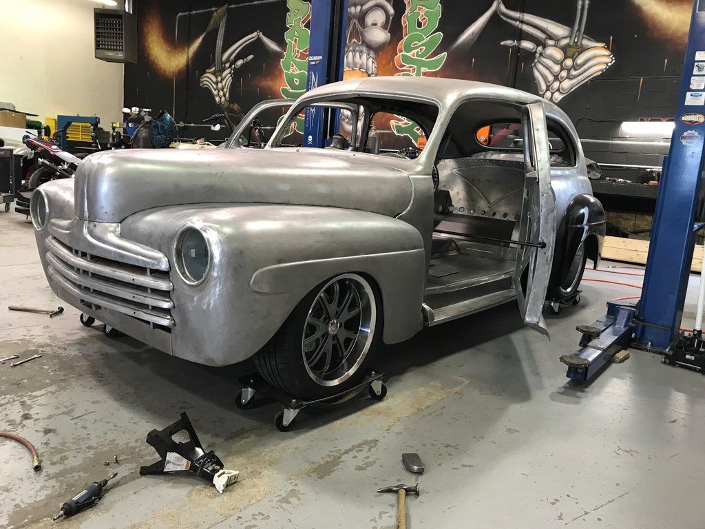 front side view of car with doors open