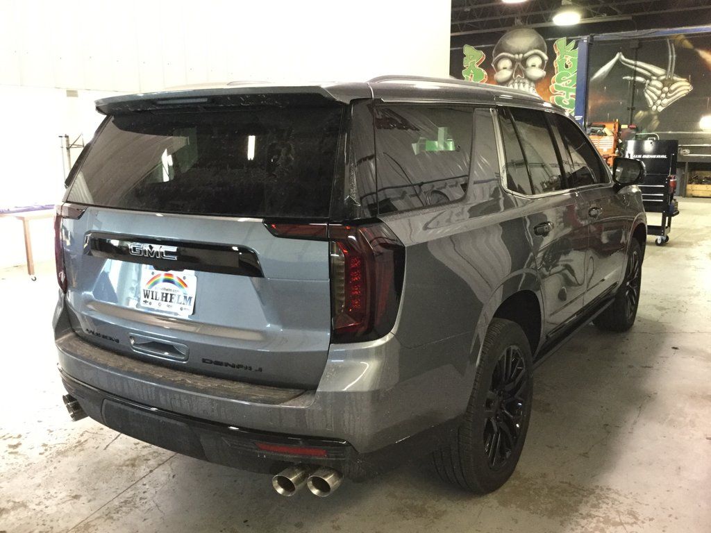 gmc yukon with customized tinted rear lights