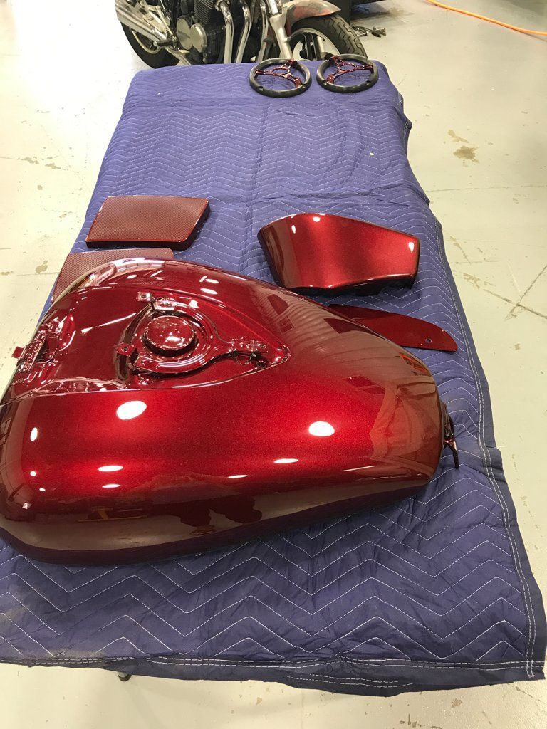 painted red motorcycle fuel tank