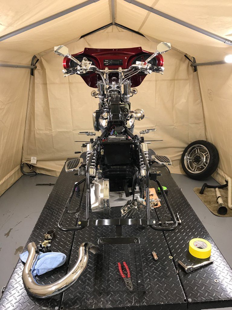 rear view of motorcycle stripped of plating